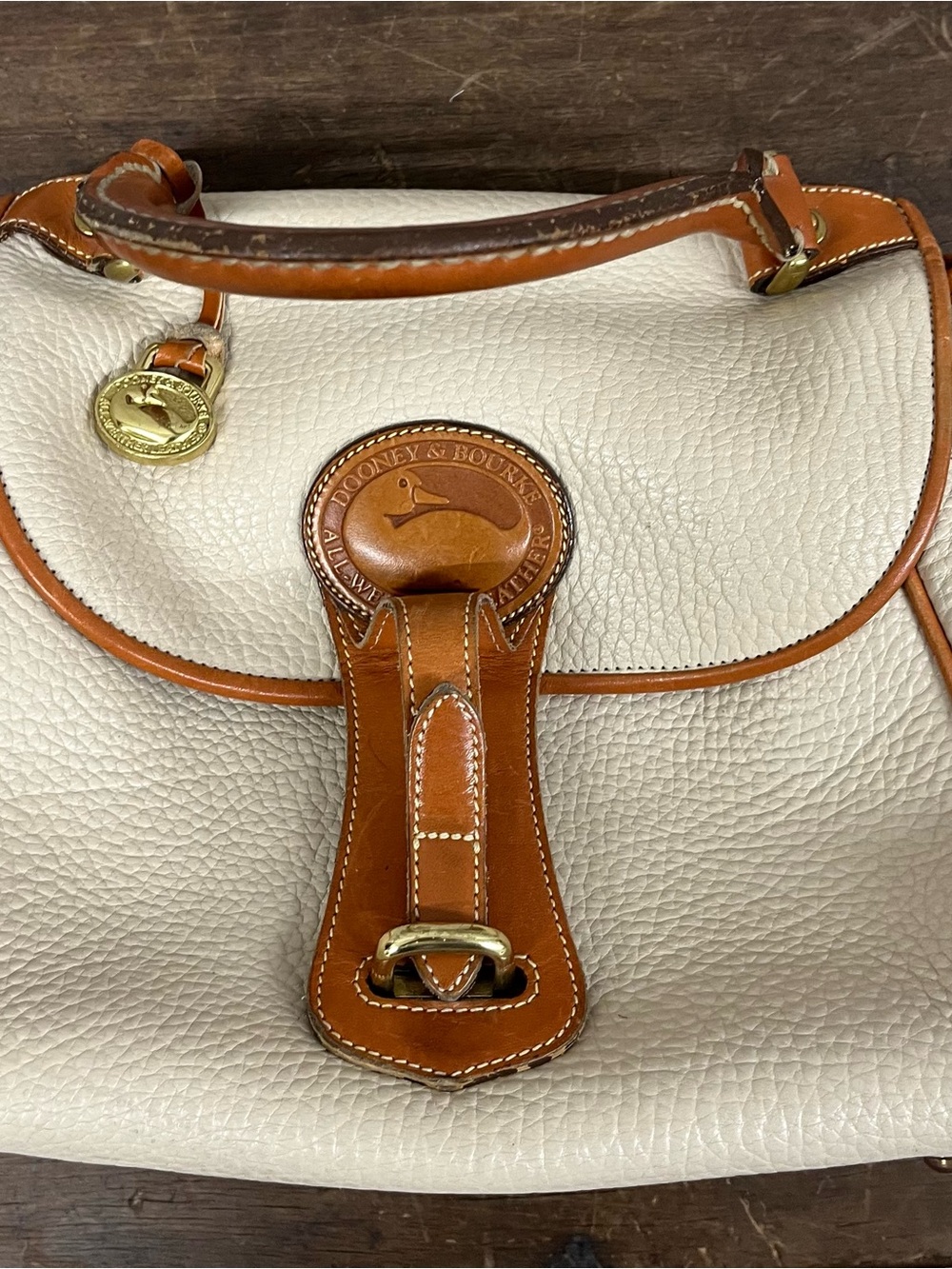 Dooney & Bourke Cream Leather Satchel with Tan Trim and Gold Hardware